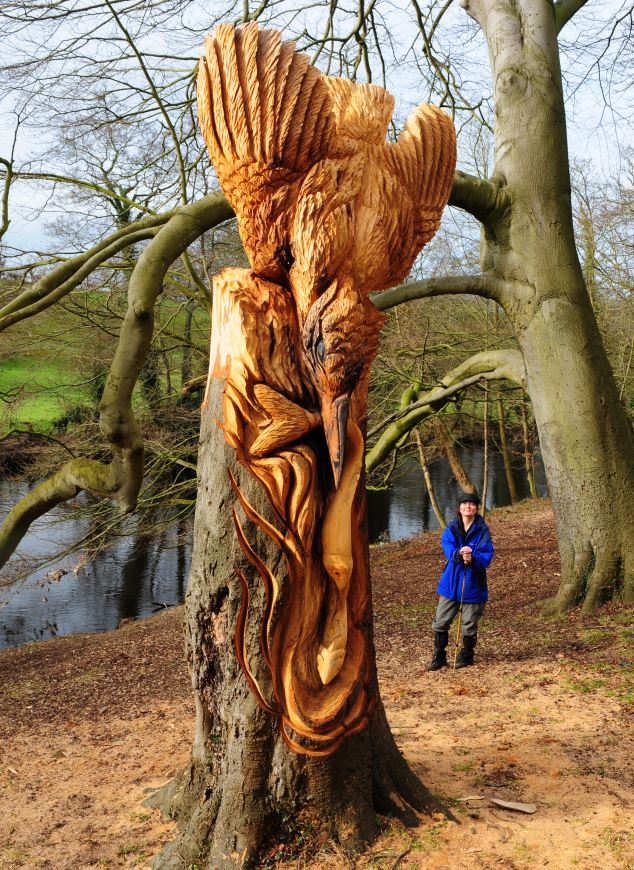 'Magnificent': This intricate carving of a kingfisher plucking a fish out of a river made an impression on locals